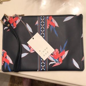 A New Day Clutch Wristlet